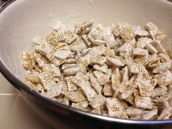 Cereal coated with the white chocolate and ready to go into the bag with the Oreos and powdered sugar