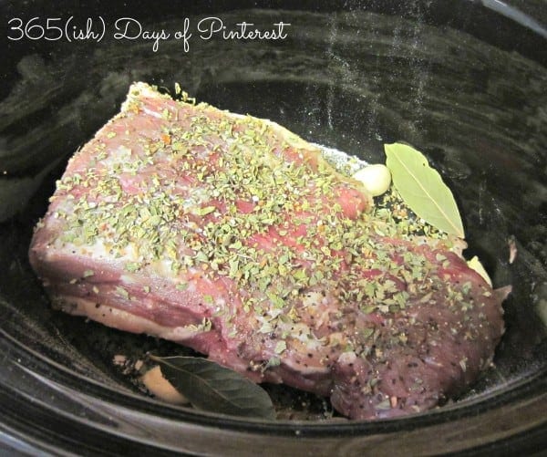 dry seasoning on beef roast in slow cooker