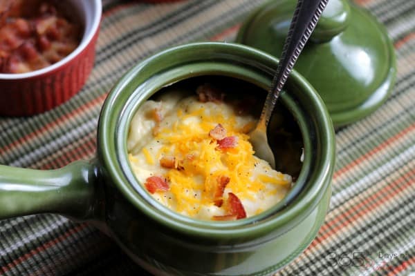 Crockpot potato soup is hearty, creamy and best of all, it's EASY. Just toss a few things in the slow cooker and dinner is ready!