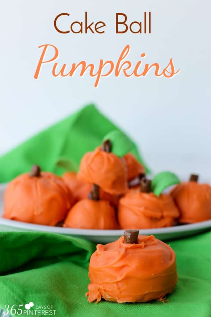 Made with spice cake and cream cheese frosting, these Cake Ball Pumpkins are a perfect party treat for Halloween, Thanksgiving or the Fall Festival!