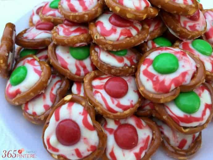 The combination of salty and sweet is what keeps you coming back for more of these Candy Cane Pretzel Bites! They are the perfect treat for holiday parties.